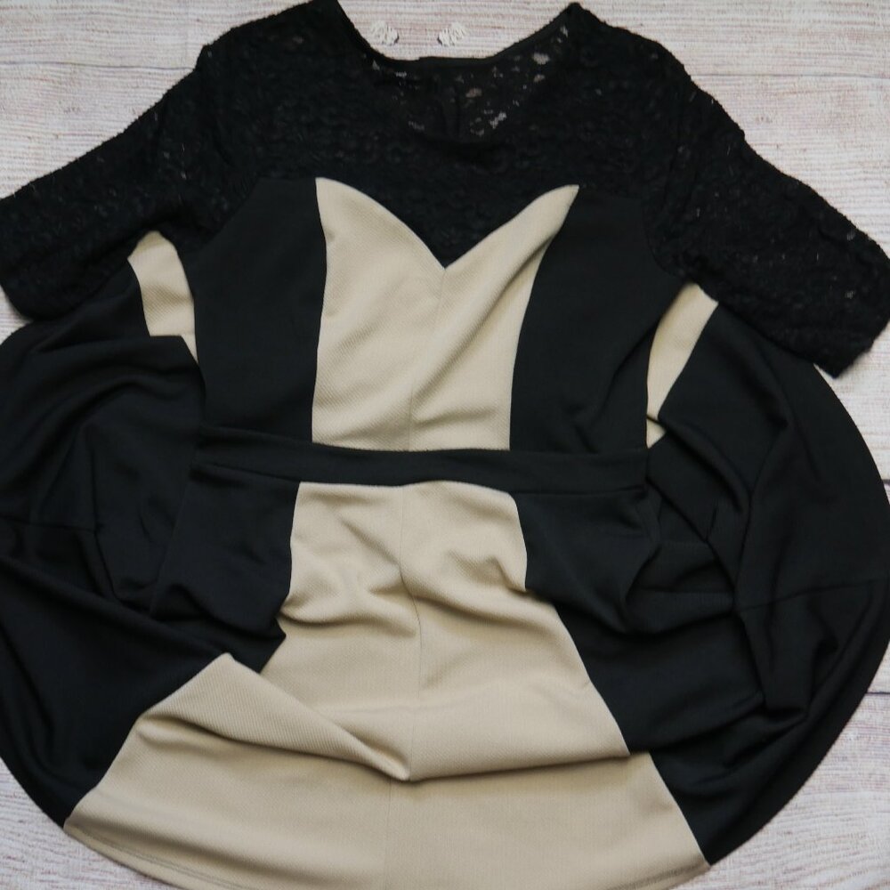 Black and tan dress with lace.